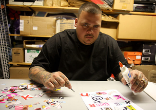 A resourceful captor pieces together a ransom note after finishing the Style section.
